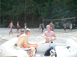 Group of people having a different activity on beach