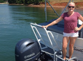 Woman taking a picture on boat