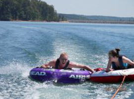 Two people riding a floater