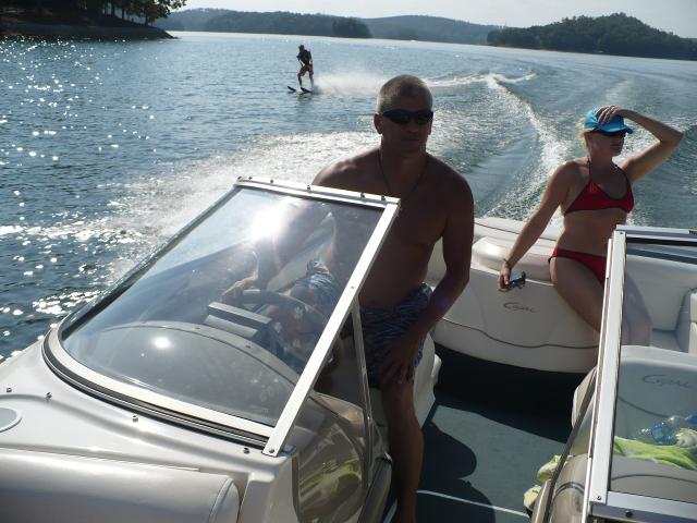 Image of man driving a boat