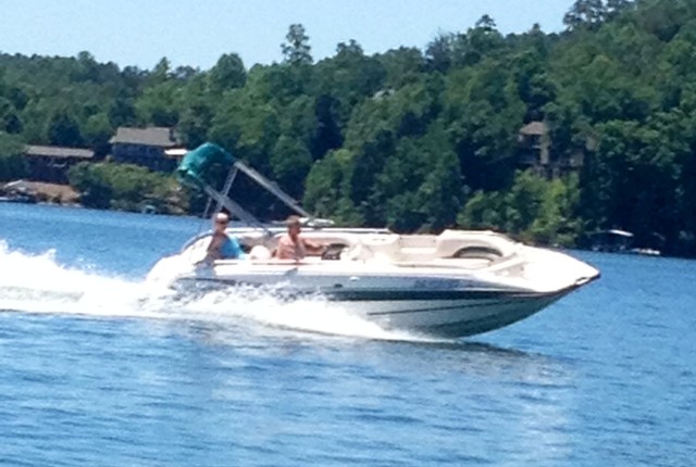 Happy couple while using a boat